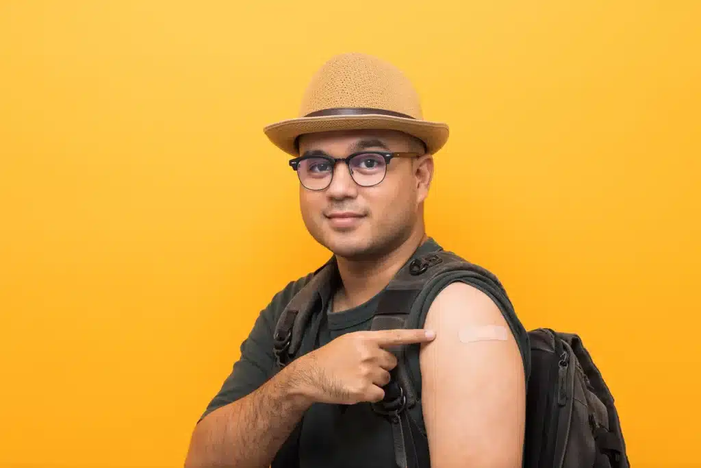 Traveler receiving vaccine