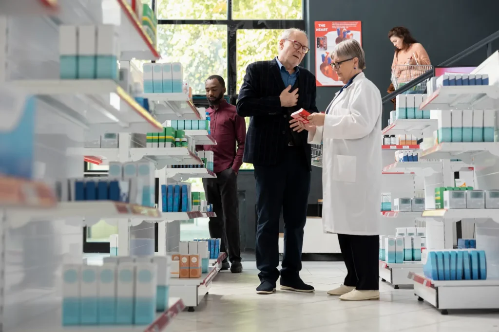 Pharmacist helping local resident